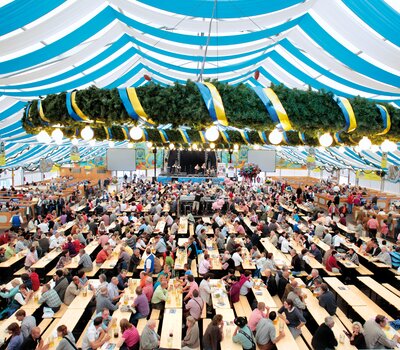 The classic beer garden table sets in natural color at Oktoberfest.