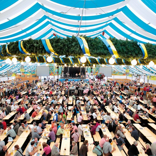 The classic beer garden table sets in natural color at Oktoberfest.